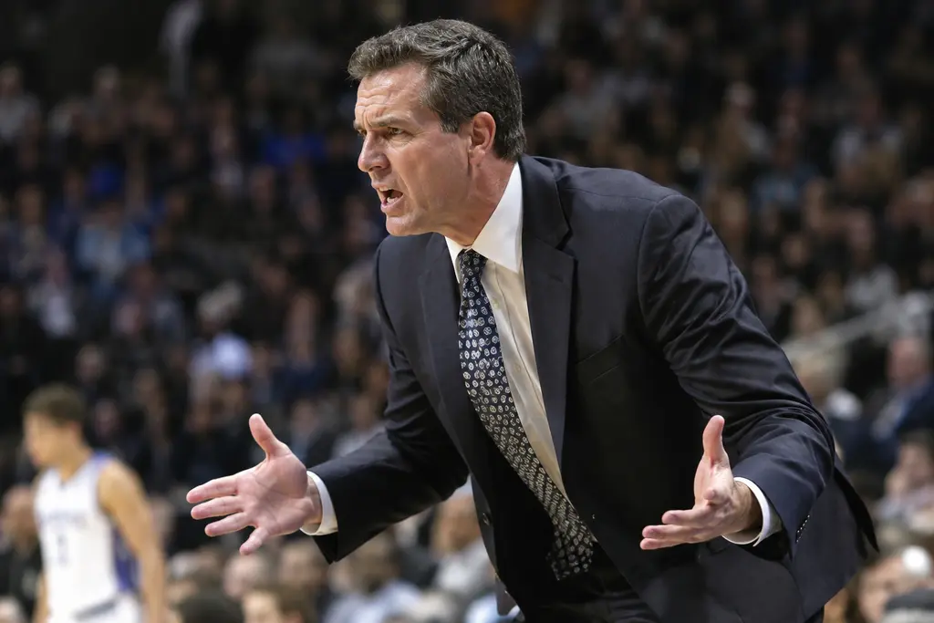 NCAA Bid Changes planning board with bracket notes and mid-major conference maps